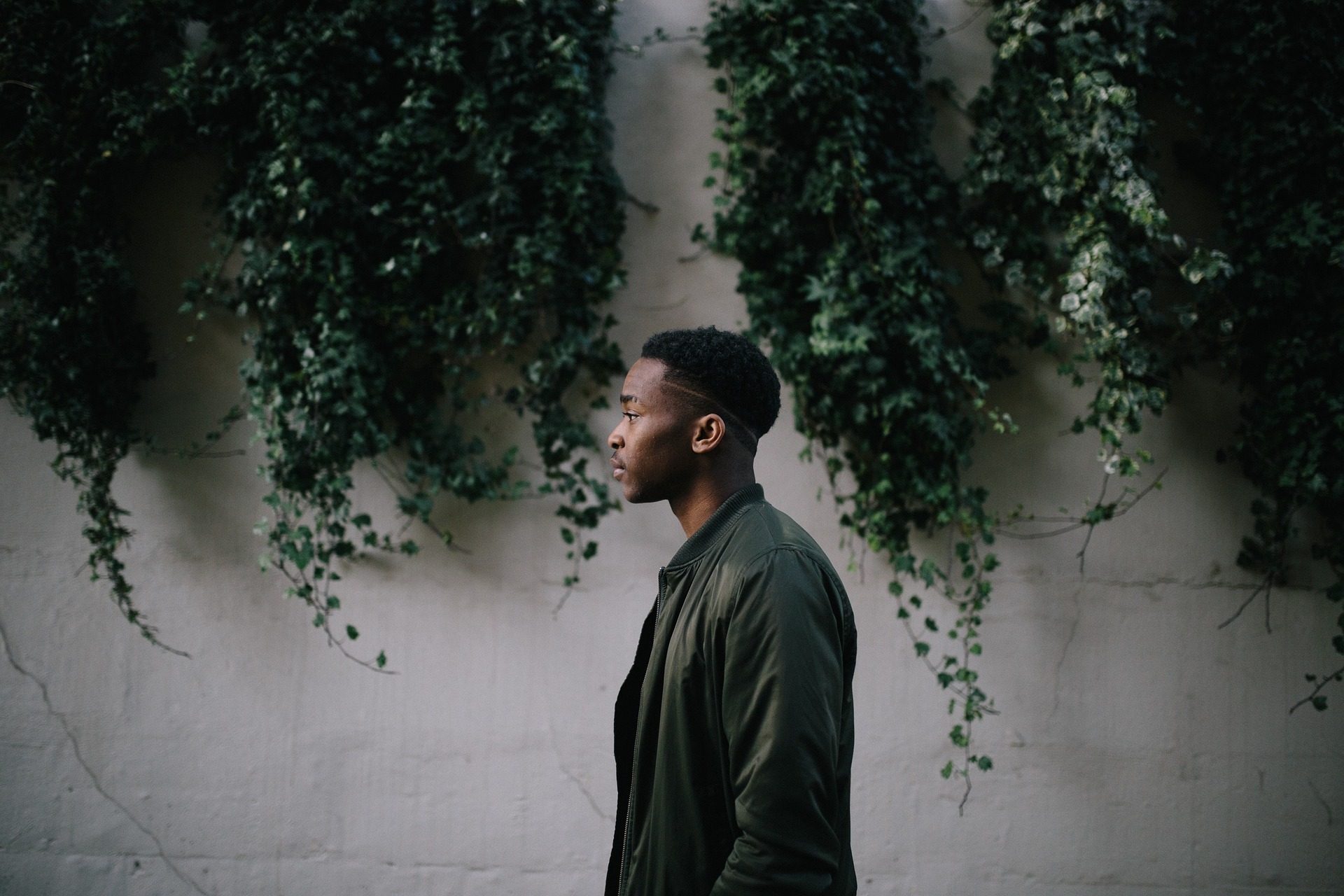 Man standing by wall