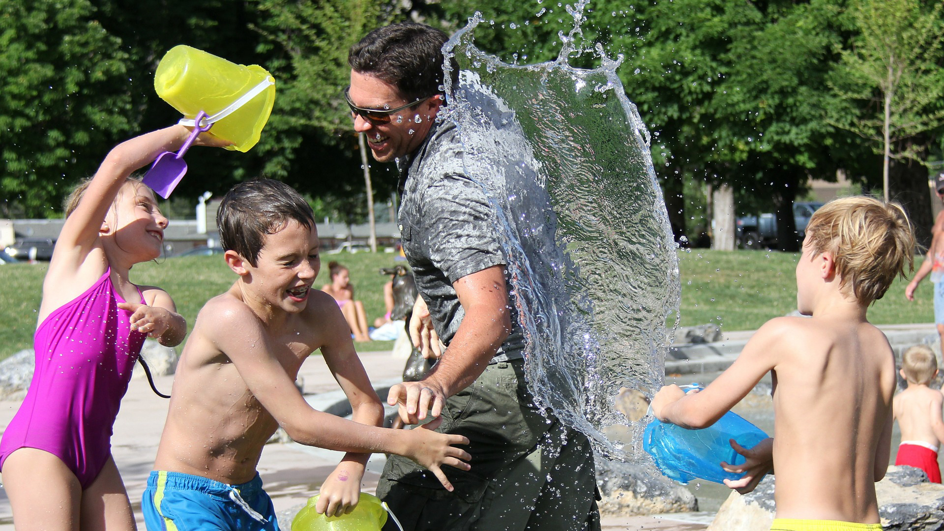 Kids playing with dad